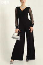 Kadın Derin V Yaka Puantiyeli Tül Kol Detaylı İspanyol Paça Tulum – Şık & Modern Tasarım