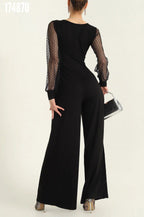 Kadın Derin V Yaka Puantiyeli Tül Kol Detaylı İspanyol Paça Tulum – Şık & Modern Tasarım